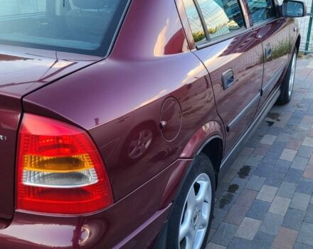 Красный Опель Астра, объемом двигателя 1.4 л и пробегом 226 тыс. км за 4500 $, фото 8 на Automoto.ua