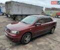 Красный Опель Астра, объемом двигателя 1.4 л и пробегом 245 тыс. км за 3300 $, фото 1 на Automoto.ua