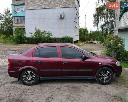 Червоний Опель Астра, об'ємом двигуна 1.6 л та пробігом 285 тис. км за 4800 $, фото 6 на Automoto.ua