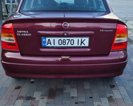 Красный Опель Астра, объемом двигателя 1.4 л и пробегом 226 тыс. км за 4500 $, фото 1 на Automoto.ua