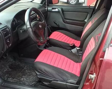 Червоний Опель Астра, об'ємом двигуна 1.4 л та пробігом 207 тис. км за 2500 $, фото 7 на Automoto.ua