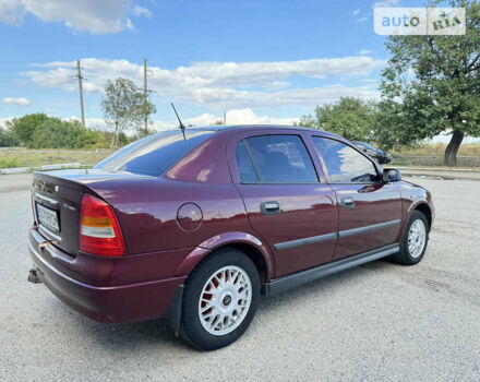 Красный Опель Астра, объемом двигателя 1.4 л и пробегом 183 тыс. км за 4200 $, фото 5 на Automoto.ua