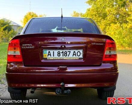 Червоний Опель Астра, об'ємом двигуна 1.4 л та пробігом 180 тис. км за 4000 $, фото 4 на Automoto.ua