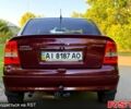 Червоний Опель Астра, об'ємом двигуна 1.4 л та пробігом 180 тис. км за 4000 $, фото 4 на Automoto.ua
