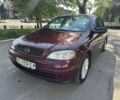 Красный Опель Астра, объемом двигателя 1.4 л и пробегом 199 тыс. км за 3700 $, фото 1 на Automoto.ua