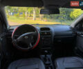 Красный Опель Астра, объемом двигателя 1.4 л и пробегом 319 тыс. км за 2350 $, фото 12 на Automoto.ua