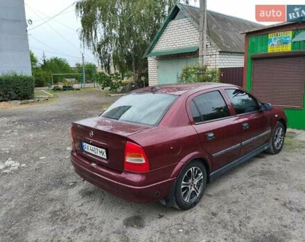 Червоний Опель Астра, об'ємом двигуна 1.6 л та пробігом 285 тис. км за 4800 $, фото 5 на Automoto.ua