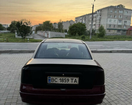 Червоний Опель Астра, об'ємом двигуна 1.4 л та пробігом 380 тис. км за 2850 $, фото 7 на Automoto.ua