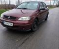 Красный Опель Астра, объемом двигателя 1.36 л и пробегом 327 тыс. км за 2900 $, фото 1 на Automoto.ua