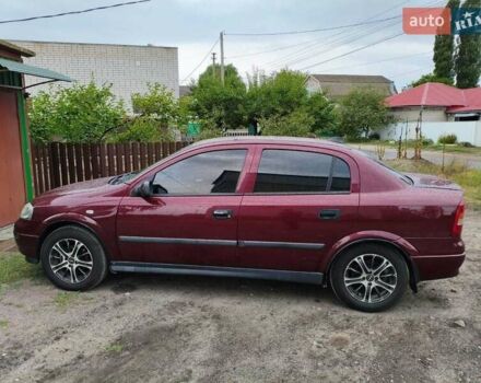 Червоний Опель Астра, об'ємом двигуна 1.6 л та пробігом 285 тис. км за 4800 $, фото 3 на Automoto.ua