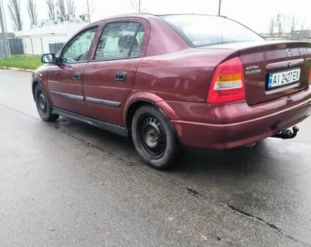Красный Опель Астра, объемом двигателя 1.36 л и пробегом 327 тыс. км за 2900 $, фото 6 на Automoto.ua