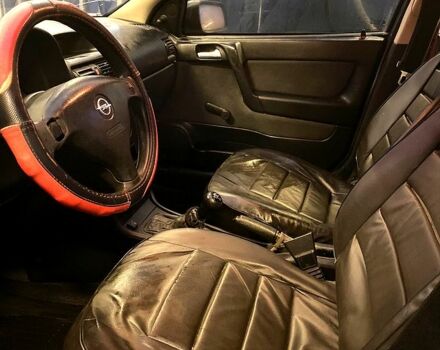 Красный Опель Астра, объемом двигателя 1.4 л и пробегом 313 тыс. км за 3800 $, фото 9 на Automoto.ua