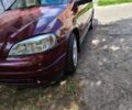 Красный Опель Астра, объемом двигателя 1.4 л и пробегом 226 тыс. км за 4500 $, фото 5 на Automoto.ua