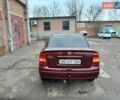 Красный Опель Астра, объемом двигателя 1.4 л и пробегом 245 тыс. км за 3300 $, фото 3 на Automoto.ua
