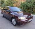 Красный Опель Астра, объемом двигателя 1.4 л и пробегом 223 тыс. км за 3499 $, фото 1 на Automoto.ua