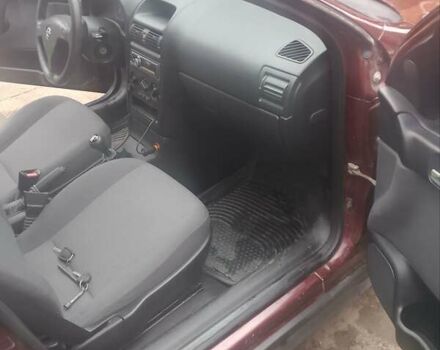 Червоний Опель Астра, об'ємом двигуна 1.6 л та пробігом 240 тис. км за 4500 $, фото 4 на Automoto.ua