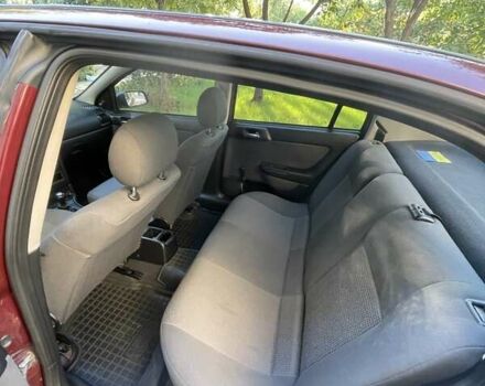 Красный Опель Астра, объемом двигателя 1.4 л и пробегом 177 тыс. км за 4600 $, фото 24 на Automoto.ua