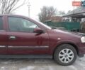 Червоний Опель Астра, об'ємом двигуна 1.4 л та пробігом 170 тис. км за 4300 $, фото 1 на Automoto.ua