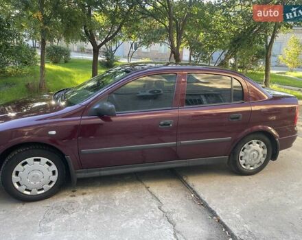 Красный Опель Астра, объемом двигателя 1.4 л и пробегом 177 тыс. км за 4600 $, фото 4 на Automoto.ua