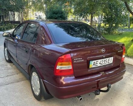 Красный Опель Астра, объемом двигателя 1.4 л и пробегом 177 тыс. км за 4600 $, фото 6 на Automoto.ua