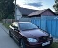 Красный Опель Астра, объемом двигателя 1.6 л и пробегом 160 тыс. км за 4300 $, фото 1 на Automoto.ua