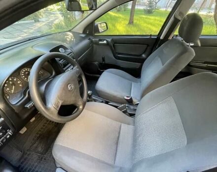 Красный Опель Астра, объемом двигателя 1.4 л и пробегом 177 тыс. км за 4600 $, фото 25 на Automoto.ua