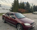 Красный Опель Астра, объемом двигателя 1.39 л и пробегом 187 тыс. км за 4800 $, фото 2 на Automoto.ua