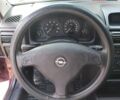 Красный Опель Астра, объемом двигателя 1.4 л и пробегом 198 тыс. км за 2999 $, фото 44 на Automoto.ua