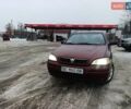 Красный Опель Астра, объемом двигателя 1.4 л и пробегом 319 тыс. км за 2999 $, фото 1 на Automoto.ua