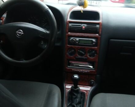 Красный Опель Астра, объемом двигателя 1.4 л и пробегом 160 тыс. км за 3500 $, фото 6 на Automoto.ua