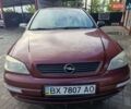Красный Опель Астра, объемом двигателя 1.4 л и пробегом 285 тыс. км за 3100 $, фото 2 на Automoto.ua