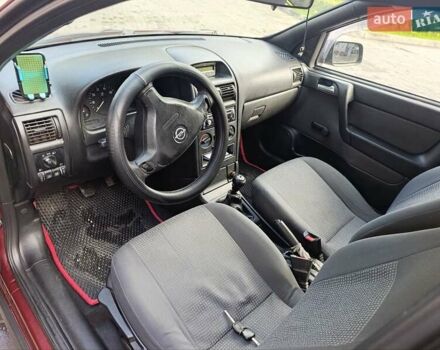 Красный Опель Астра, объемом двигателя 1.4 л и пробегом 285 тыс. км за 3100 $, фото 8 на Automoto.ua