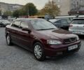 Красный Опель Астра, объемом двигателя 1.6 л и пробегом 265 тыс. км за 3588 $, фото 1 на Automoto.ua