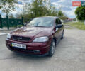 Красный Опель Астра, объемом двигателя 1.4 л и пробегом 102 тыс. км за 4750 $, фото 1 на Automoto.ua