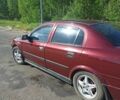 Красный Опель Астра, объемом двигателя 1.6 л и пробегом 204 тыс. км за 3000 $, фото 1 на Automoto.ua