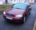 Красный Опель Астра, объемом двигателя 1.4 л и пробегом 160 тыс. км за 3500 $, фото 1 на Automoto.ua