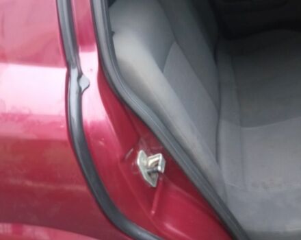 Красный Опель Астра, объемом двигателя 1.4 л и пробегом 160 тыс. км за 3500 $, фото 3 на Automoto.ua