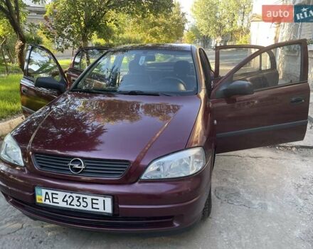 Красный Опель Астра, объемом двигателя 1.4 л и пробегом 177 тыс. км за 4600 $, фото 11 на Automoto.ua