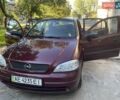 Красный Опель Астра, объемом двигателя 1.4 л и пробегом 177 тыс. км за 4600 $, фото 11 на Automoto.ua