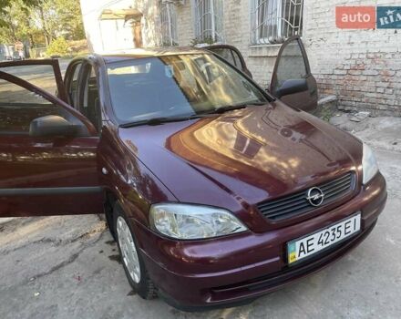 Красный Опель Астра, объемом двигателя 1.4 л и пробегом 177 тыс. км за 4600 $, фото 12 на Automoto.ua