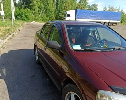 Красный Опель Астра, объемом двигателя 1.6 л и пробегом 204 тыс. км за 3000 $, фото 4 на Automoto.ua