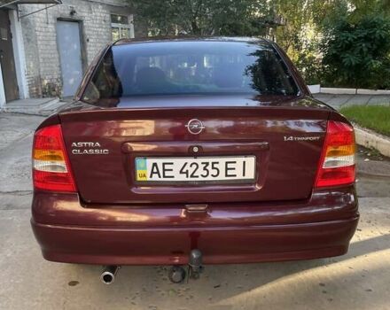 Красный Опель Астра, объемом двигателя 1.4 л и пробегом 177 тыс. км за 4600 $, фото 7 на Automoto.ua
