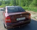 Красный Опель Астра, объемом двигателя 1.6 л и пробегом 204 тыс. км за 3000 $, фото 2 на Automoto.ua