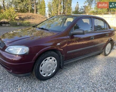 Красный Опель Астра, объемом двигателя 1.4 л и пробегом 177 тыс. км за 4600 $, фото 18 на Automoto.ua