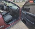 Красный Опель Астра, объемом двигателя 1.36 л и пробегом 198 тыс. км за 2850 $, фото 9 на Automoto.ua