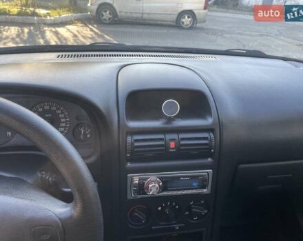 Красный Опель Астра, объемом двигателя 1.4 л и пробегом 177 тыс. км за 4600 $, фото 21 на Automoto.ua