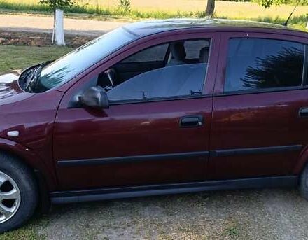 Красный Опель Астра, объемом двигателя 1.6 л и пробегом 250 тыс. км за 4700 $, фото 5 на Automoto.ua
