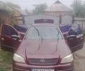 Красный Опель Астра, объемом двигателя 1.6 л и пробегом 240 тыс. км за 4200 $, фото 1 на Automoto.ua