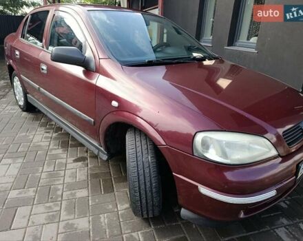 Красный Опель Астра, объемом двигателя 1.4 л и пробегом 285 тыс. км за 3100 $, фото 3 на Automoto.ua