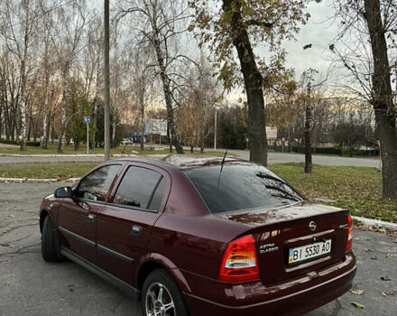 Красный Опель Астра, объемом двигателя 1.39 л и пробегом 187 тыс. км за 4800 $, фото 5 на Automoto.ua